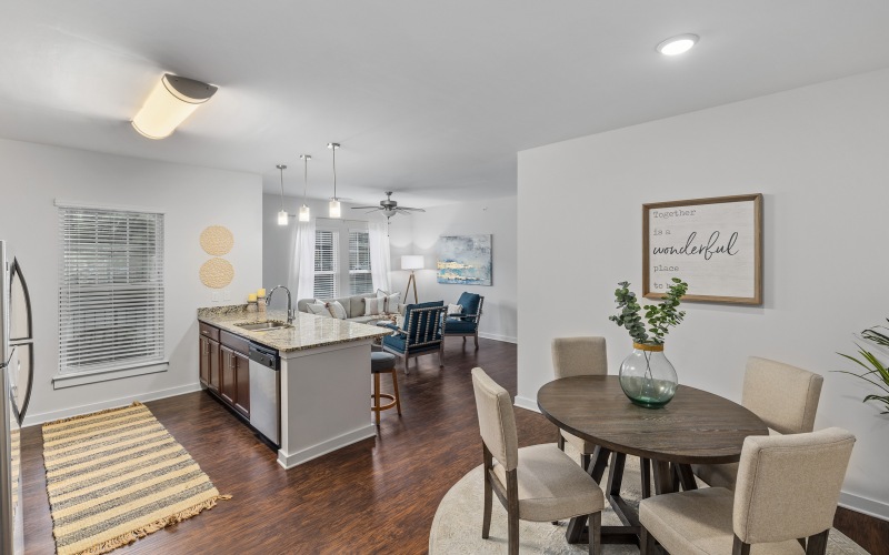 Dining room area and kitchen area with open concept design