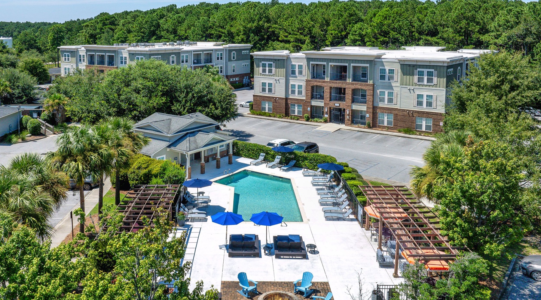 Resort-style swimming pool with lounge seating