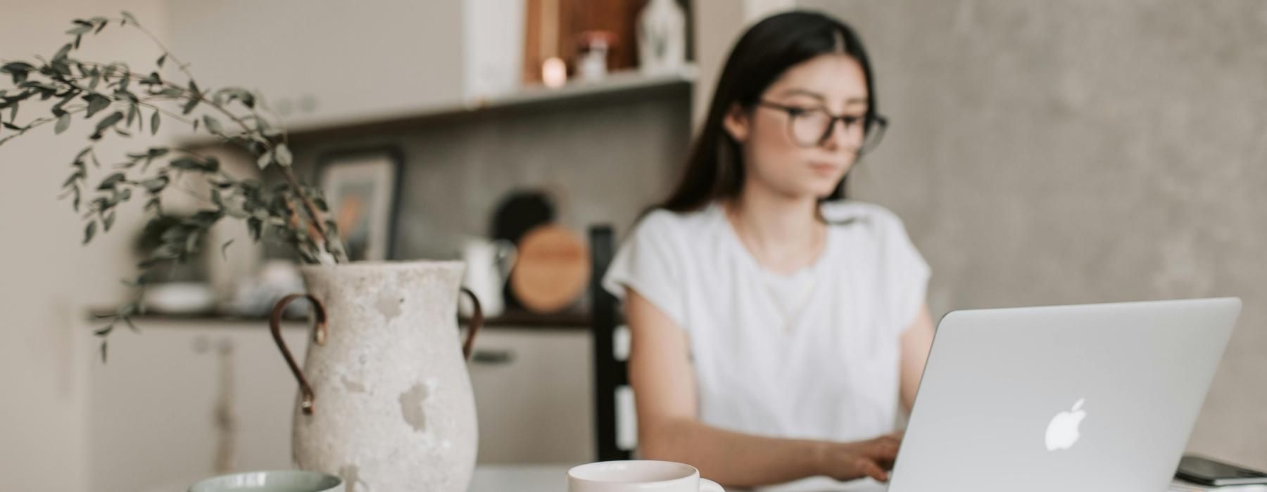 a woman working on her laptop